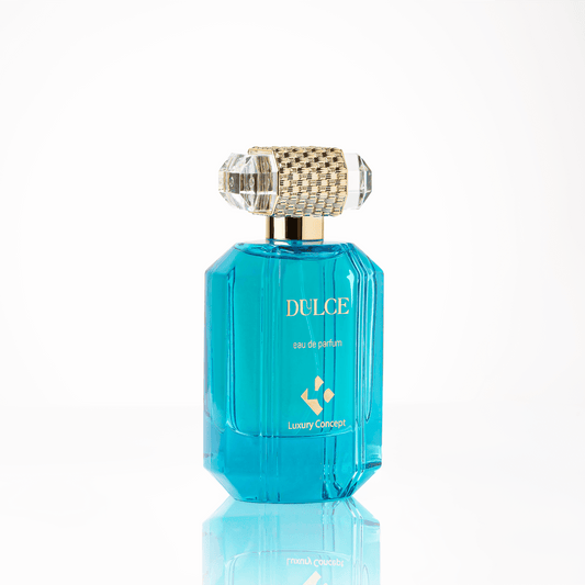 Elegant Dulce bottle with rich blue tones and reflective gold detailing, hinting at warm amber and spice notes perfect for Ramadan nights.