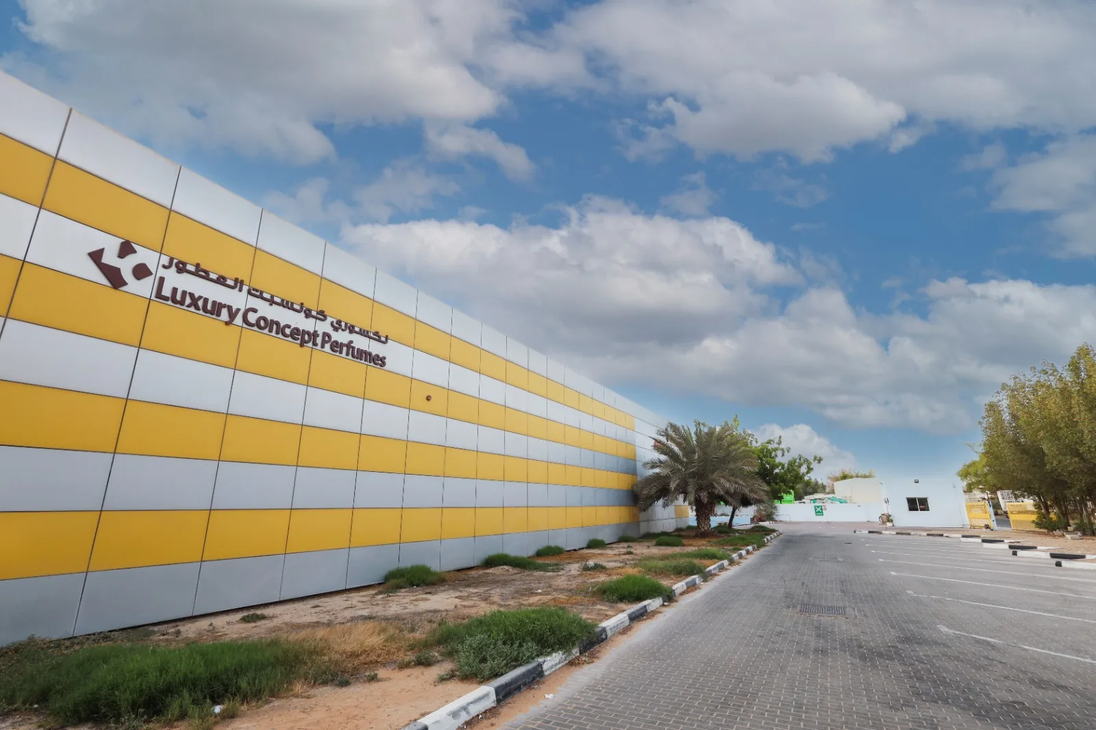 Exterior of the Luxury Concept Perfumes factory in Dubai with bilingual Arabic and English signage