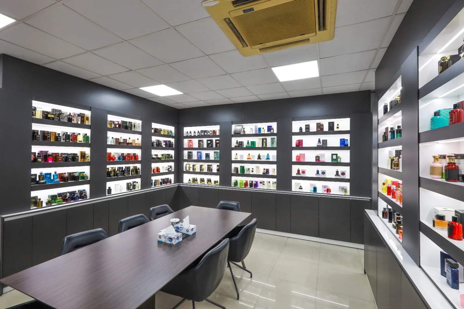 Luxury Concept showroom in Dubai with illuminated shelves of perfumes from the brand portfolio