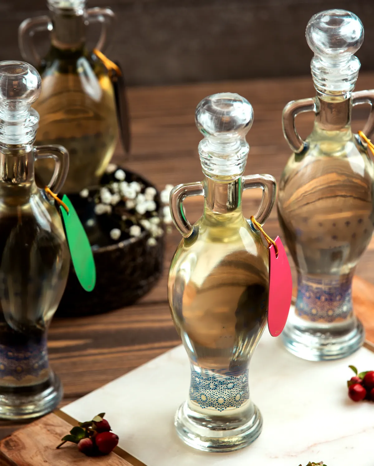 Ornate perfume bottles representing the four oud families