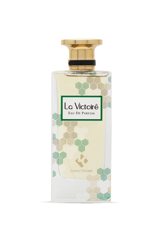 A bottle of 'Le Victoire' EDP from Luxury Concept with a gold cap and a label featuring a green and white floral design.