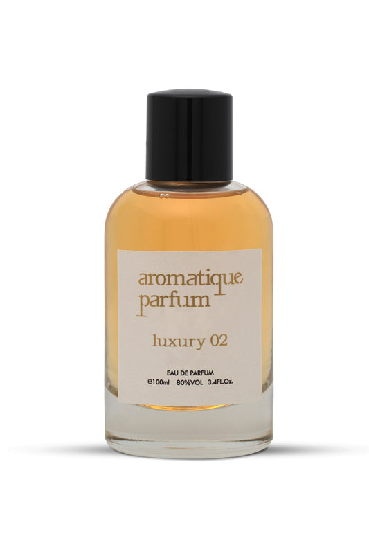 A bottle of LUXURY 02 by AROMATIQUE PARFUM, an eau de parfum fragrance. The bottle is clear with a black cap and a label that reads 'luxury 02'.