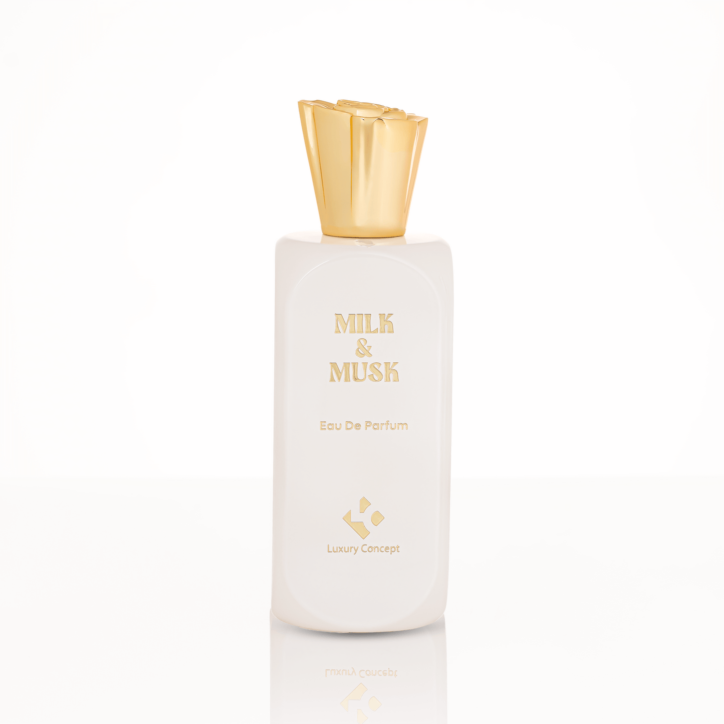 Opulent white glass Milk & Musk perfume bottle with gold metal cap and smooth form, echoing vanilla and caramel top notes with powdery, musky base.