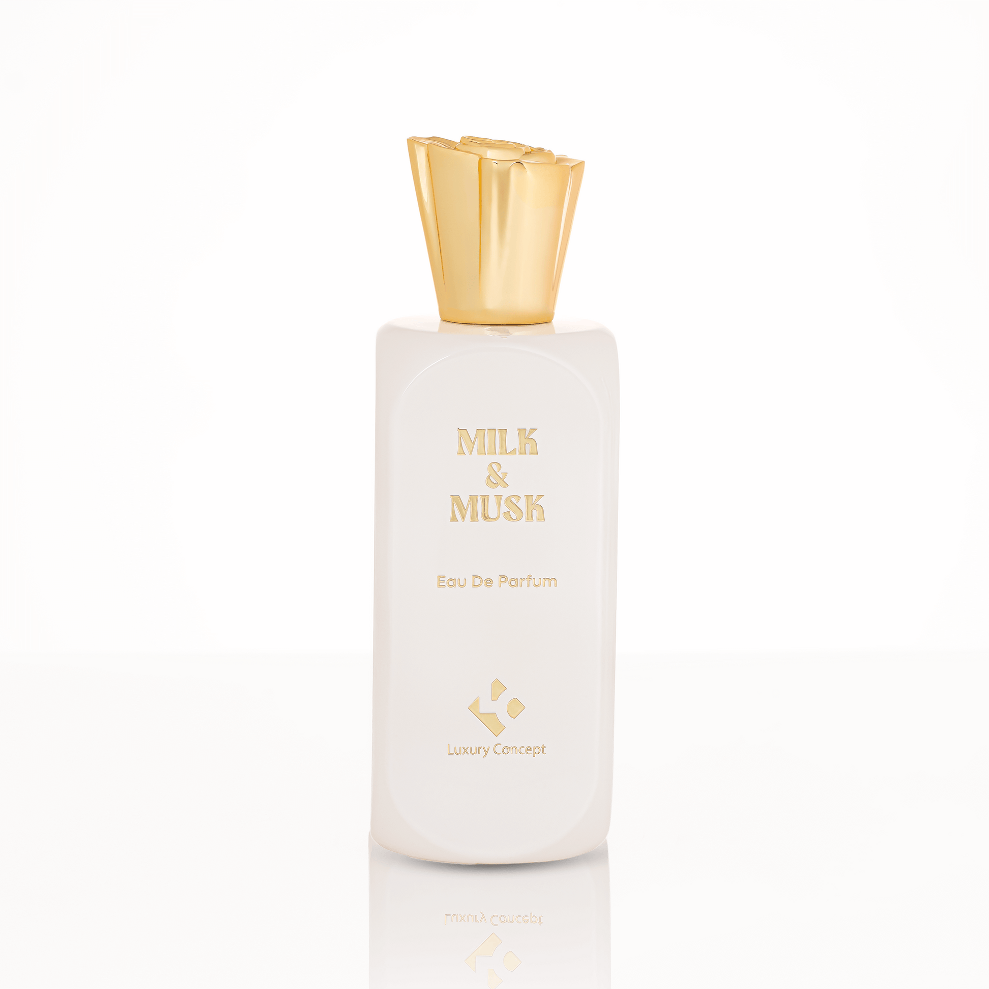 Opulent white glass Milk & Musk perfume bottle with gold metal cap and smooth form, echoing vanilla and caramel top notes with powdery, musky base.