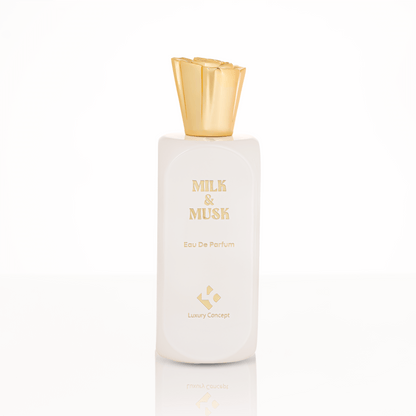 Opulent white glass Milk & Musk perfume bottle with gold metal cap and smooth form, echoing vanilla and caramel top notes with powdery, musky base.